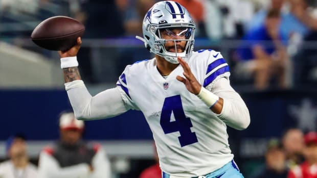 Sep 11, 2022; Arlington, Texas, USA; Dallas Cowboys quarterback Dak Prescott (4) throws during the first quarter against the Tampa Bay Buccaneers at AT&T Stadium. Mandatory Credit: Kevin Jairaj-USA TODAY Sports